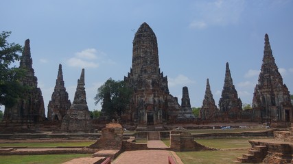 Striking restored ruins of a 17th-century royal Buddhist temple in a picturesque, riverside setting - Wat Chai Wattanaram