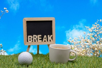 Golfer break time with coffee and golf ball on blue sky background