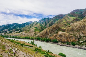 Fototapeta na wymiar Mountains and mountain river.
