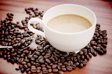 Hot coffee with coffee beans