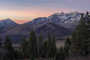 Mountain sunrise distant peak late autumn
