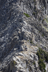 Fototapeta na wymiar Hikers on a mountain ridge resting