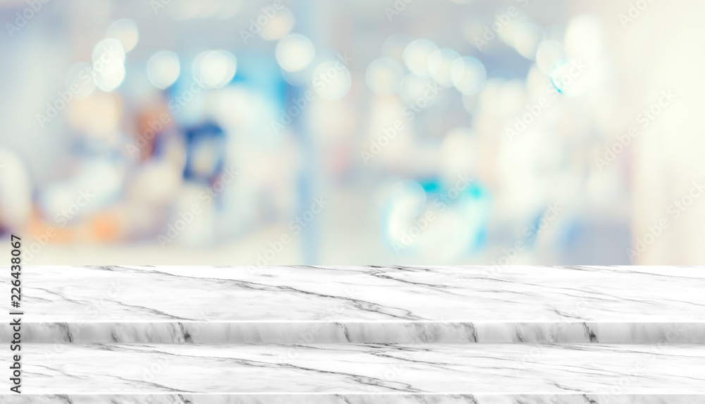 Poster empty step marble table top food stand with blur department store background bokeh light,mock up for