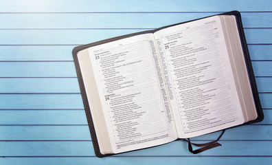 Obraz premium Bible on a Wooden Table Set out for a Personal Bible Study