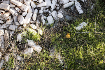 Plastic waste on grass