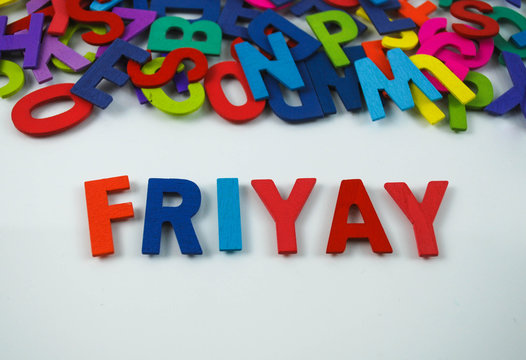 Colorful wooden alphabet wit text friyay