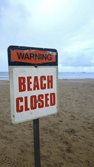 Tropical beach closed to public. - 226440896