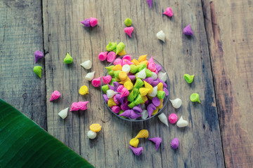 Thai colorful candy on wooden background