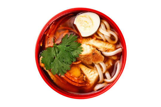 Top View Image Of Japanese Ramen Soup With Egg, Pork And Noodles Isolated At White Background.