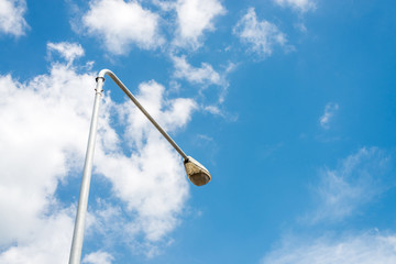 street light lamp and blue sky with cloud
