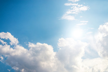 Blue sky with soft clouds and beautiful day of sun.