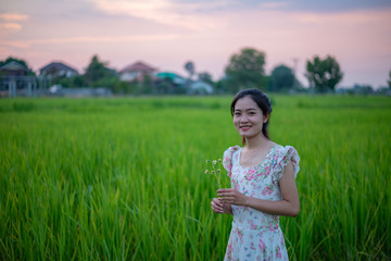 Portrait of Asia women in the rice field