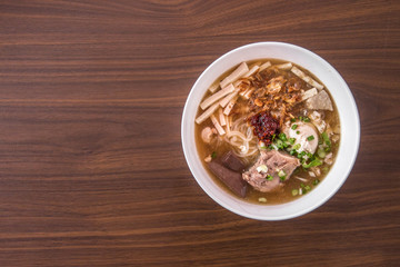 Chicken Noodle Placed on Wooden Table