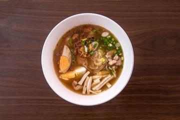 Chicken Noodle Placed on Wooden Table