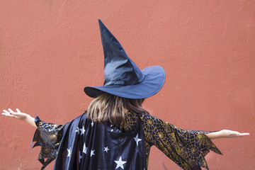 portrait of witch from behind. Halloween party