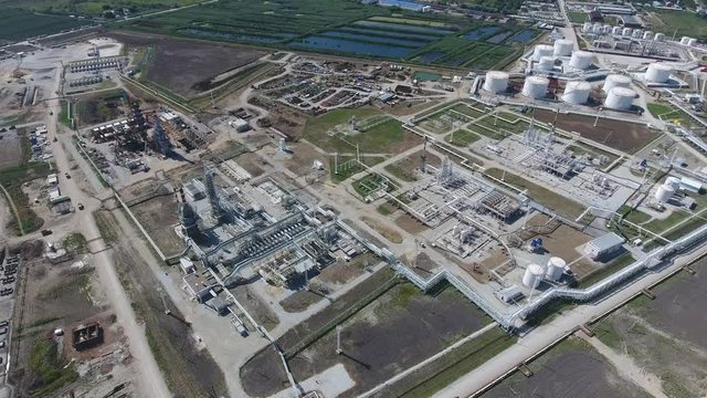 Oil refinery plant for primary and deep oil refining. Equipment and tanks in the oil refinery. Rectification and vacuum equipment