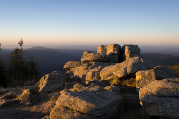 Beautiful rock stones on the hill in the national park Giant mountains at sunrise at sunset