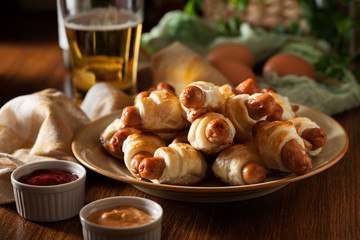 Pigs in blankets. Dark mood