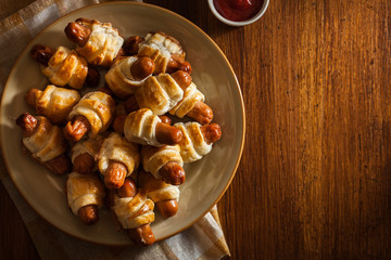 Pigs in blankets. Dark mood