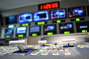 Equipment in control room for television production.