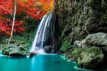 Amazing water fall in autumn forest at fall season 