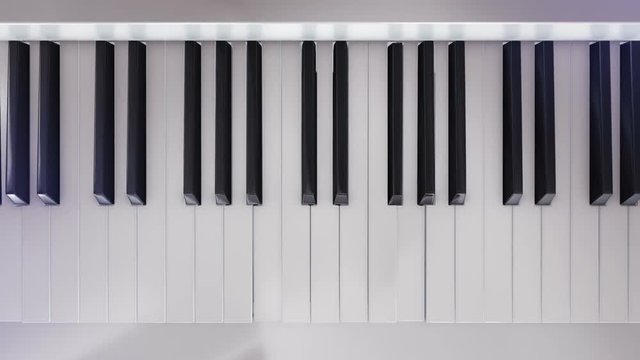 Background with animation of play on piano, synthesizer or electronic piano. Animation pushing of piano keys player. Animation of seamless loop.