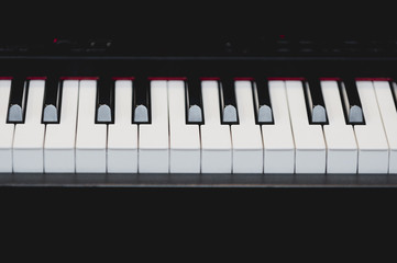 Fototapeta premium Close up detail of the piano keyboard. World of music