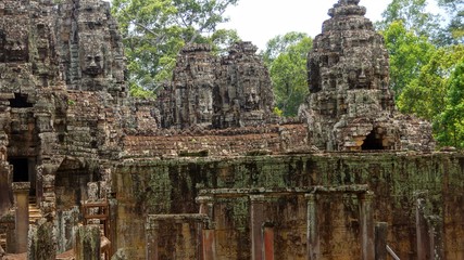 Fototapeta premium There are over 200 faces of Bayon , a temple in Angkor Thom and each of them is unique in its own way as they stare at you from every corner