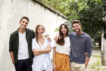Two couples smiling together, portrait