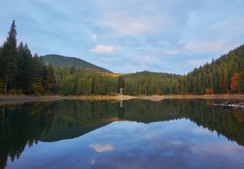 Fototapeta na wymiar Beautiful Synevyr lake surrounded with forest.