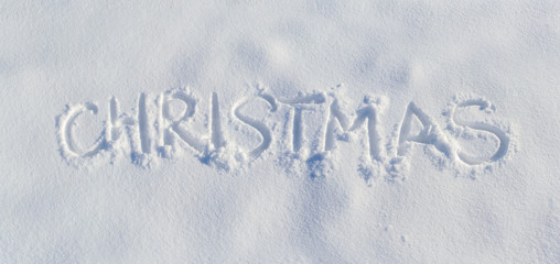 Panorama word Christmas imprint on pure frosty snow