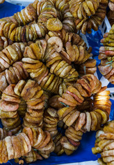 Dried brown figs on the rope on Montenegro's farm market.
