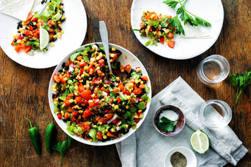 Mexican taco salad plate dark wooden table