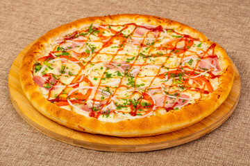 Pizza with ham and chicken