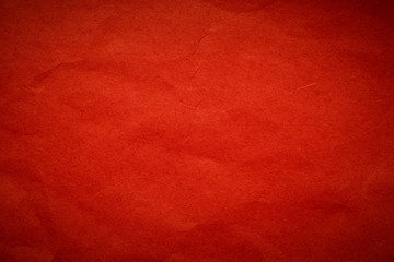 Texture of old red  crumpled paper cardboard for background 