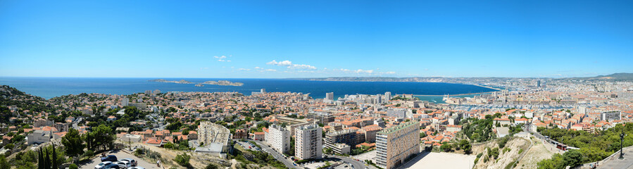 Fototapeta na wymiar panoramic view of marseille France old harbour and cityscape view from the hill of notre dame de la garde famous landmark
