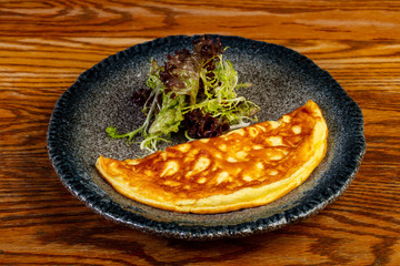 Omelet with salad
