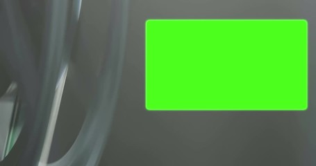 old movie film projector with 16 x 9 aspect ratio chroma key green screen background and flicker effect, vintage style concept