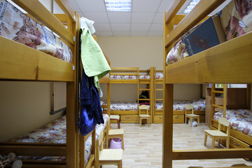 Obraz na płótnie Canvas Moscow, Russia - September, 24, 2018: Interior of a kindergarten bedroom with two-level beds in Moscow privet school