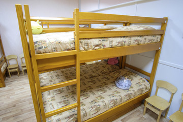 Moscow, Russia - September, 24, 2018: Interior of a kindergarten bedroom with two-level beds in Moscow privet school