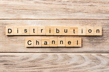 distribution channel word written on wood block. distribution channel text on table, concept