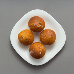 Freshly baked butter croissant grey background, top view