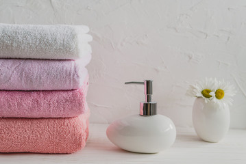 soft cotton towels and soap in the bathroom