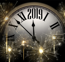 Obraz na płótnie Canvas New Year 2019 background with clock and golden sparkle firework.