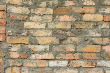 Brick texture with scratches and cracks. It can be used as a background