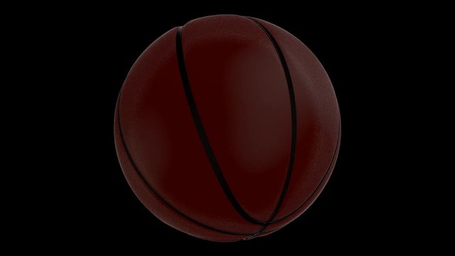 Animated spinning brown basketball against black background from other angle. Isolated and loop able. Mask included.