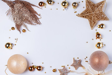 Christmas flat lay styled frame with golden decorations, copy space on white desktop