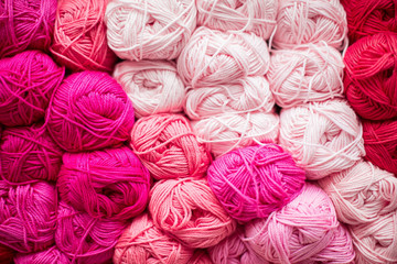Fototapeta na wymiar Colored balls of yarn. Knitting needles. Crocheting yarn