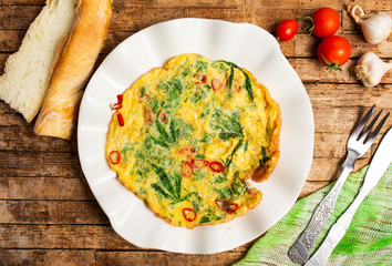 Egg omelet with marijuana leafs on a plate