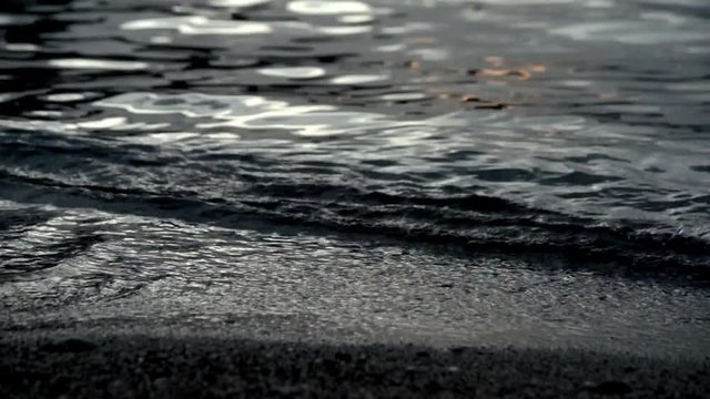 Sea surf at sunset 